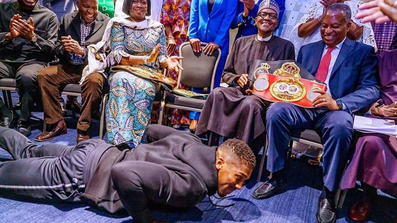 Anthony Joshua: Heavyweight champion presents belts to President Buhari in UK