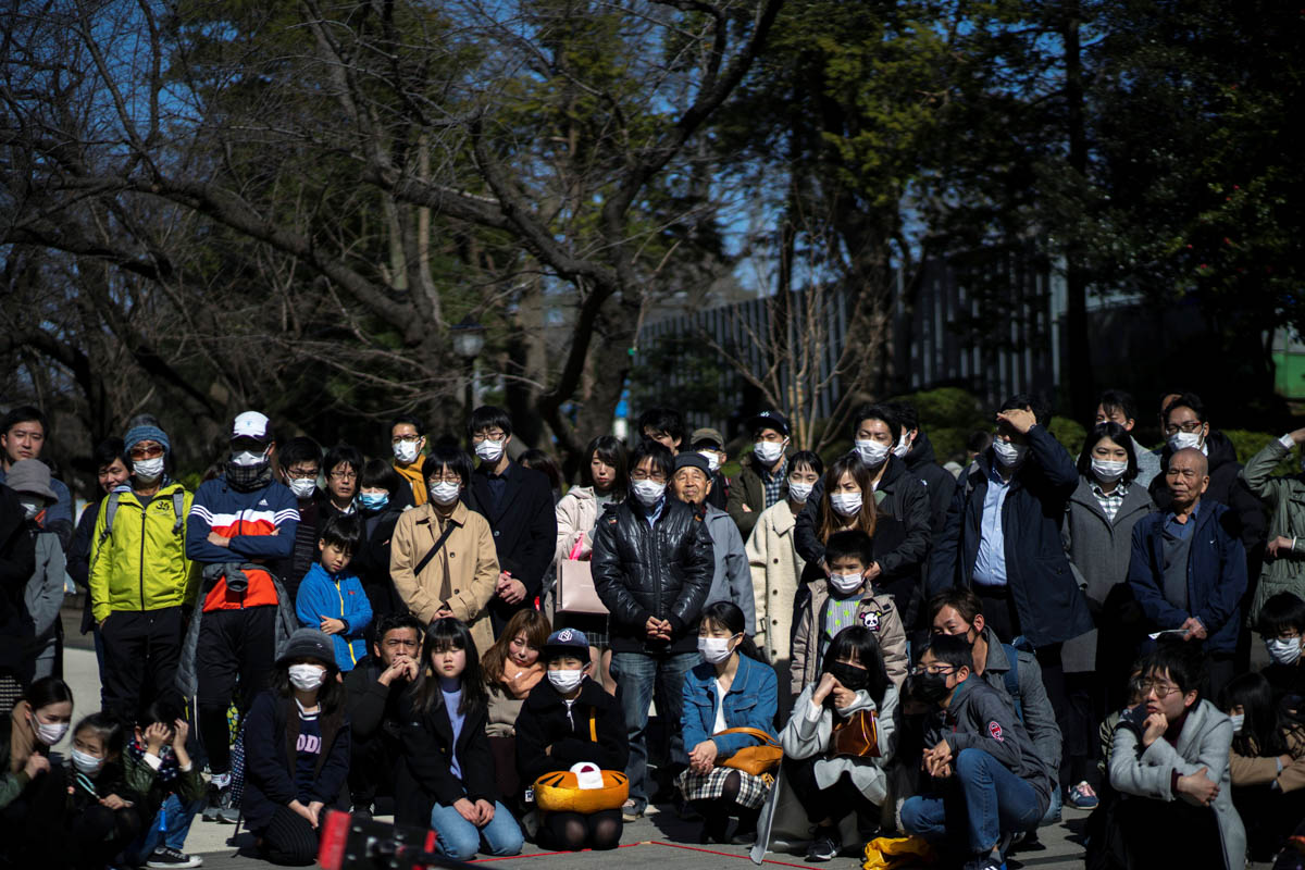 https://www.westafricanpilotnews.com/wp-content/uploads/2020/02/Peolple-wearing-mask-in-Tokyo-Japan.jpg