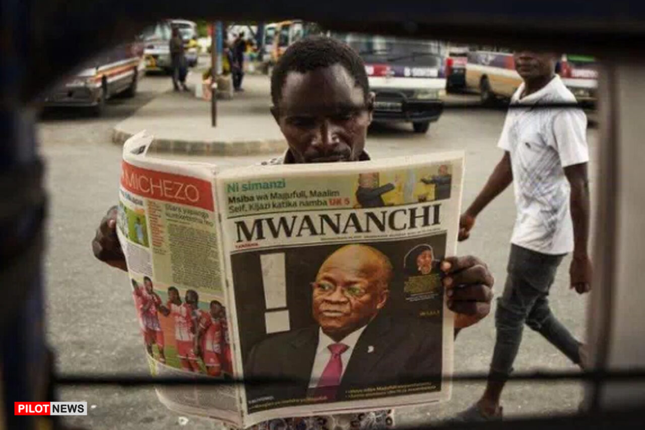 https://www.westafricanpilotnews.com/wp-content/uploads/2021/03/Tanzania-A-man-reads-a-newspaper-with-a-headline-announcing-the-death-of-Tanzanias-President-John-Magufuli-in-Dar-es-Salaam-on-March-18-2021_2-1280x853.jpg