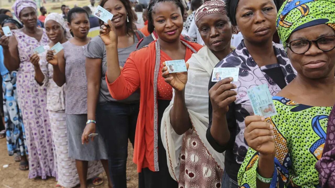 https://www.westafricanpilotnews.com/wp-content/uploads/2021/11/Voters-show-off-their-Nigerian-voter-identification-cards_File-1280x720.jpg