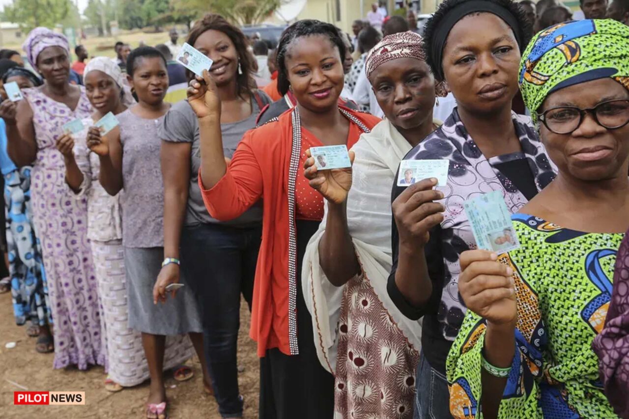 https://www.westafricanpilotnews.com/wp-content/uploads/2021/11/Voters-show-off-their-Nigerian-voter-identification-cards_File-1280x853.jpg