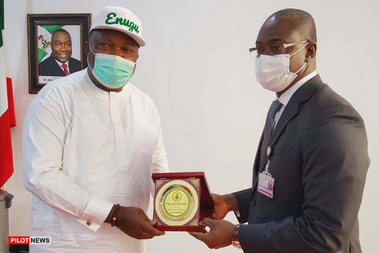 https://www.westafricanpilotnews.com/wp-content/uploads/2022/02/Ugwuanyi-receiving-a-plaque-from-National-Centre-for-the-Control-of-Small-Arms-and-Light-Weapons-2-23-22-1280x853.jpg