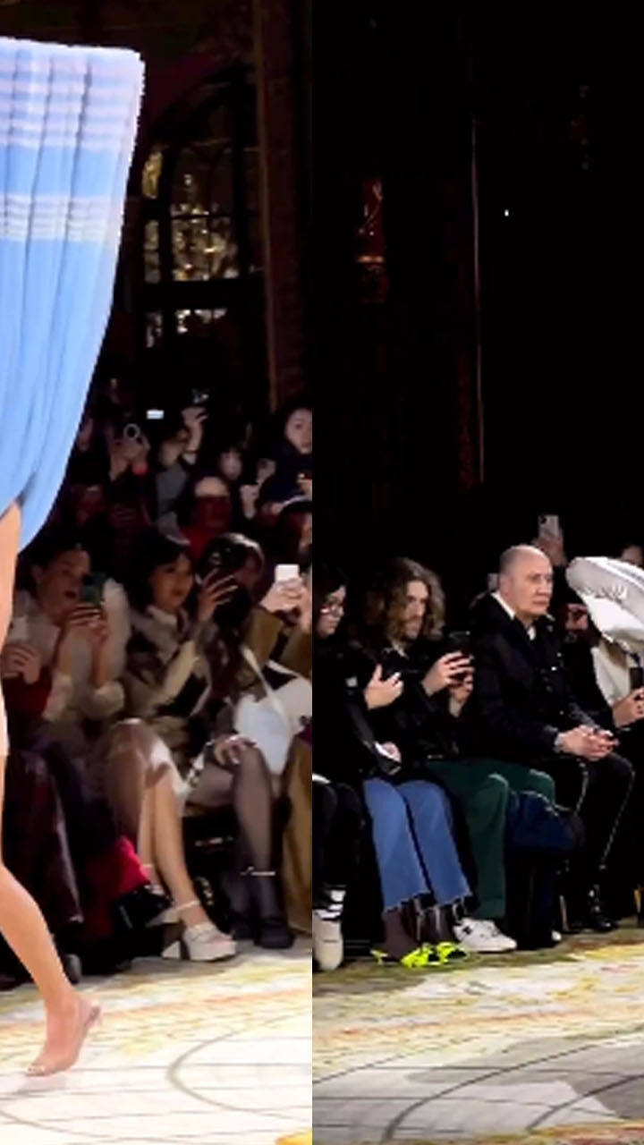Watch a video of models wearing upside-down, sideways gowns at a fashion show