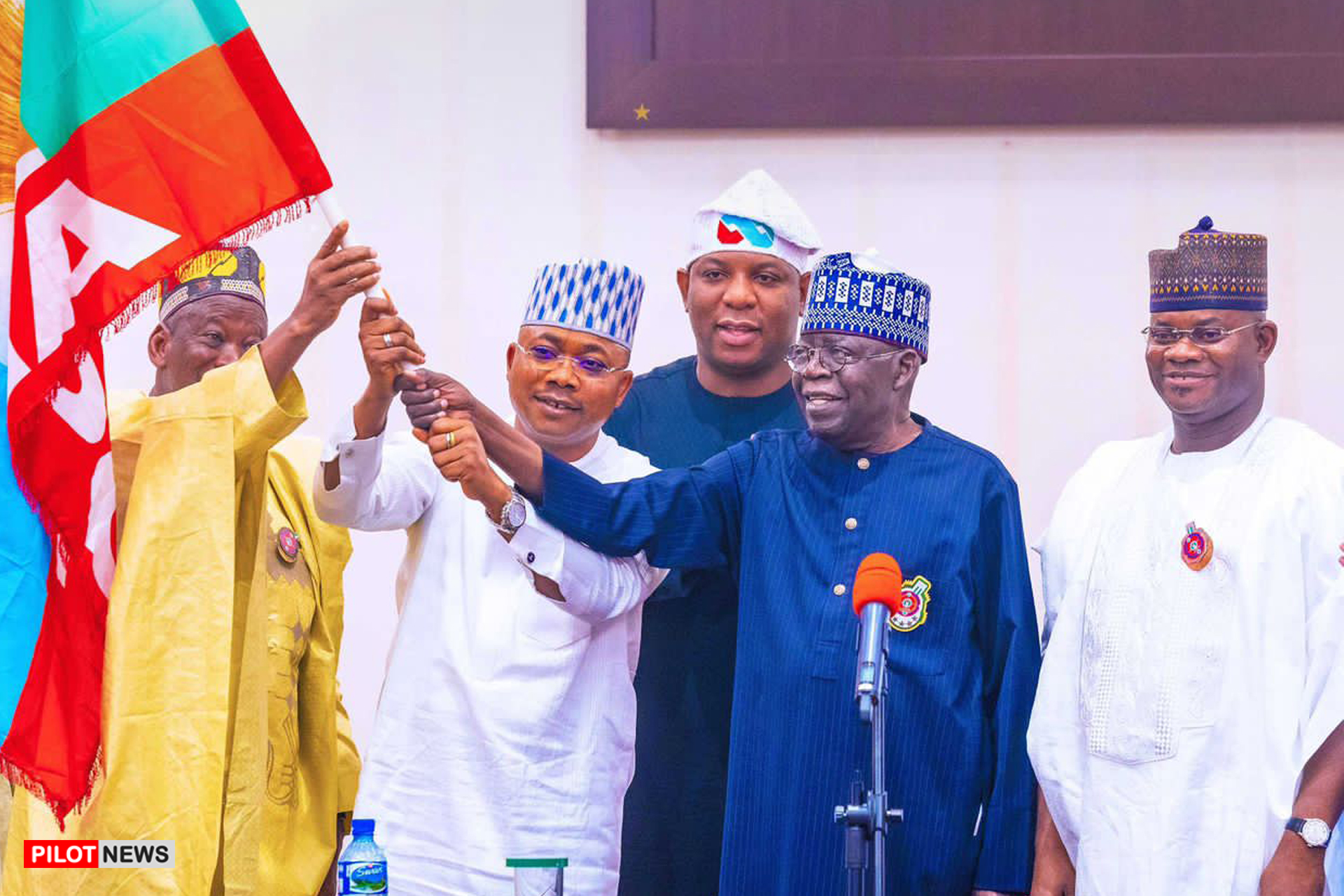 Kogi Poll: President Tinubu presents APC flag to Ododo, party's candidate -, image size:1920x1280