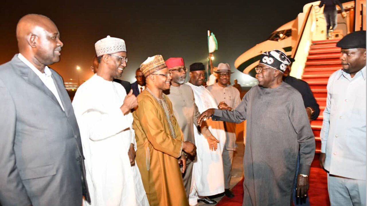 Tinubu returns to Abuja after overseas trip to France